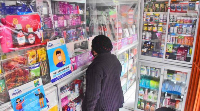 Venta de medicamentos en una farmacia.